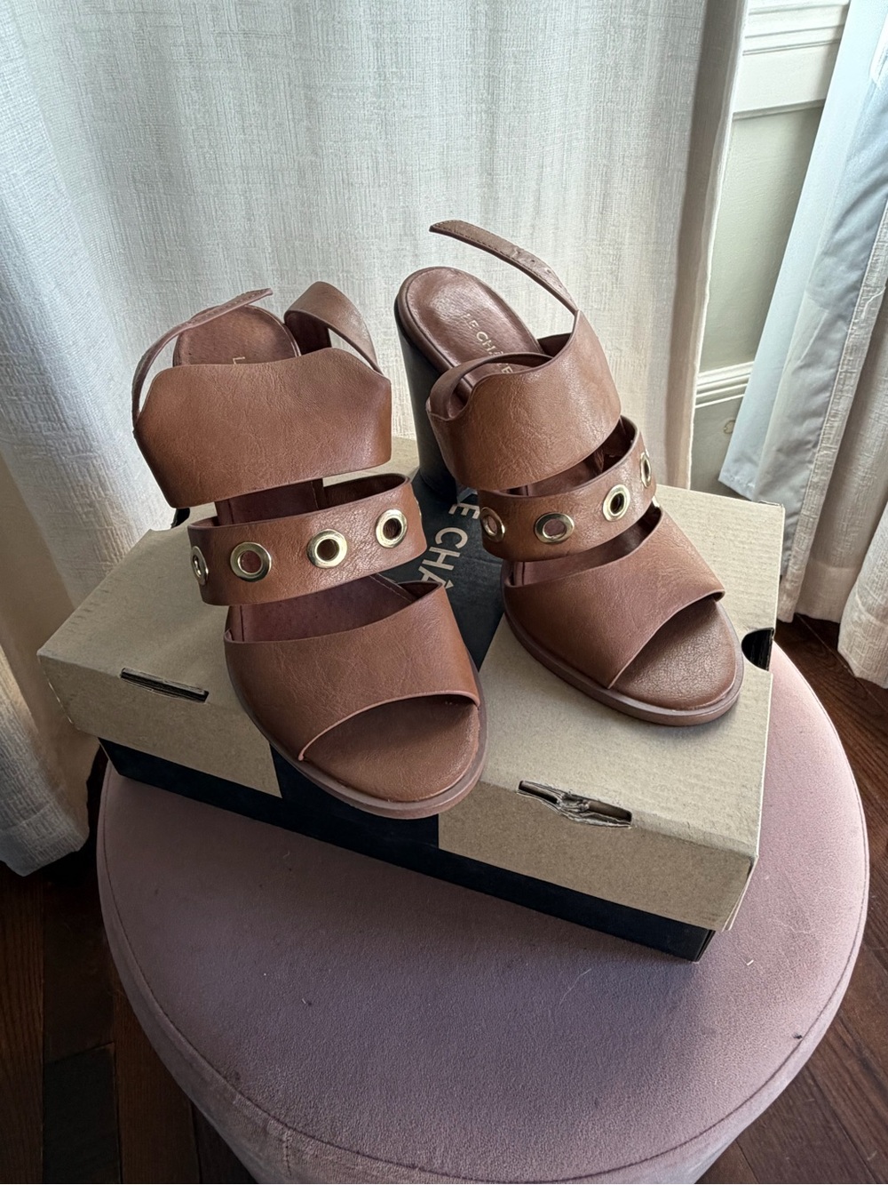 le chateau Brown Grommet Strap Block Heels
